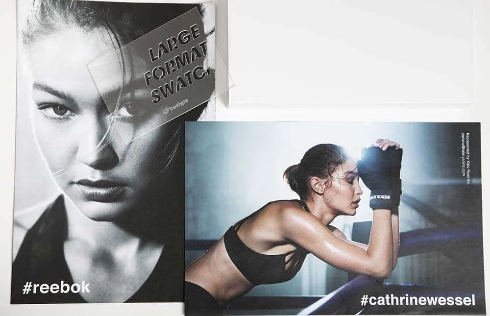 Two women fitness models featured on marketing posters from Bestype Printing NYC