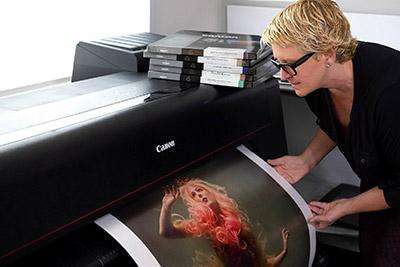 Person printing out artwork