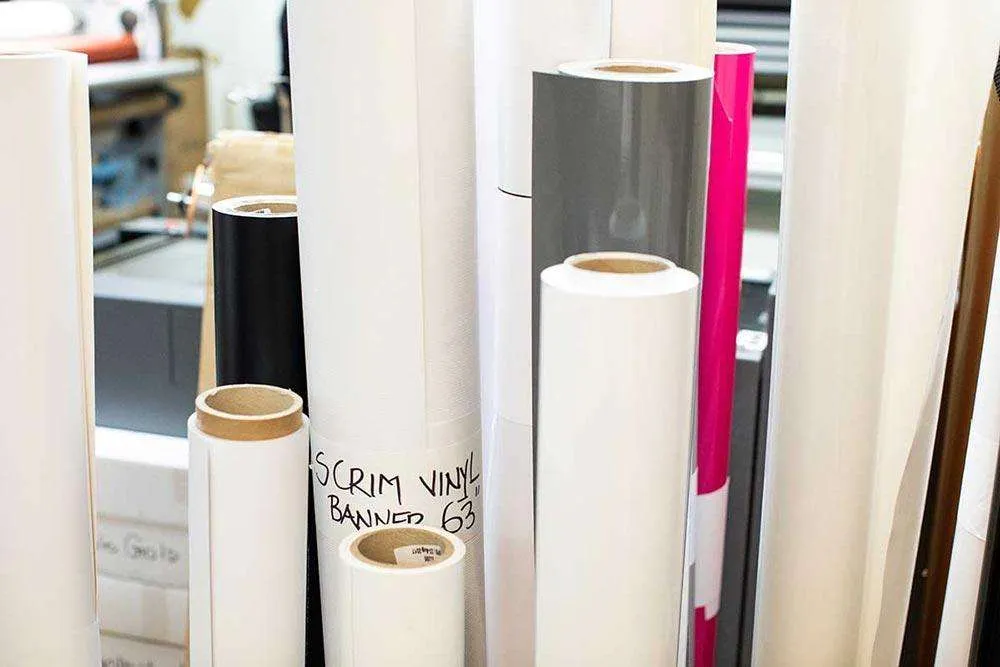 Different sizes of poster paper rolled up ready to be used in in Bestype Printing NYC's local print shop